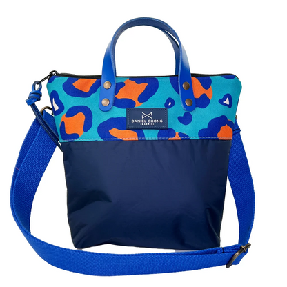 BANDOLERA MINI CON MANILLAS GRAPHIC EDITION