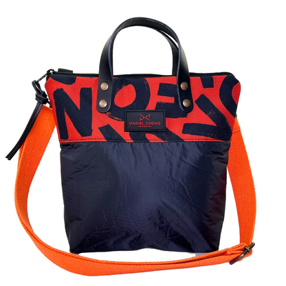 BANDOLERA MINI CON MANILLAS GRAPHIC EDITION