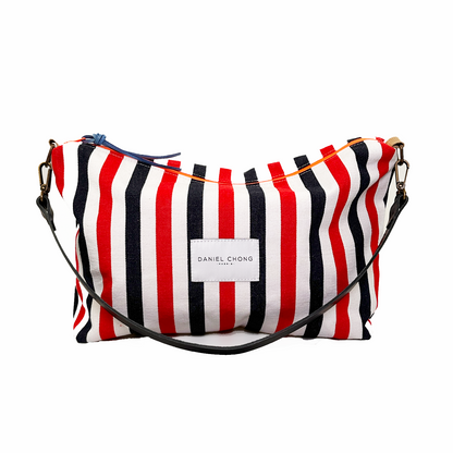 BOLSO DE LONA RÚSTICA A RAYAS ROJAS Y AZULES, ZIP NARANJO FLÚOR